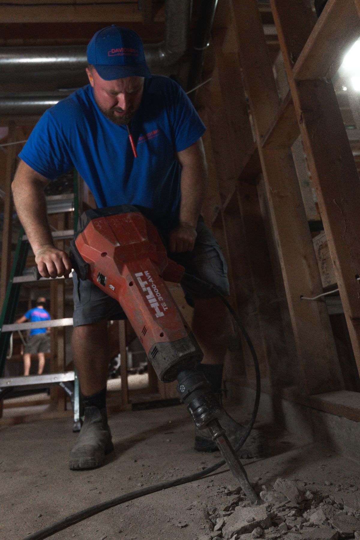 Davidson Plumbing crew on the job, photographed by Mike Mala Media