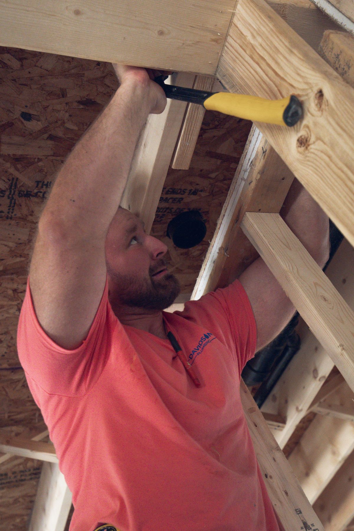 Davidson Plumbing crew on the job, photographed by Mike Mala Media