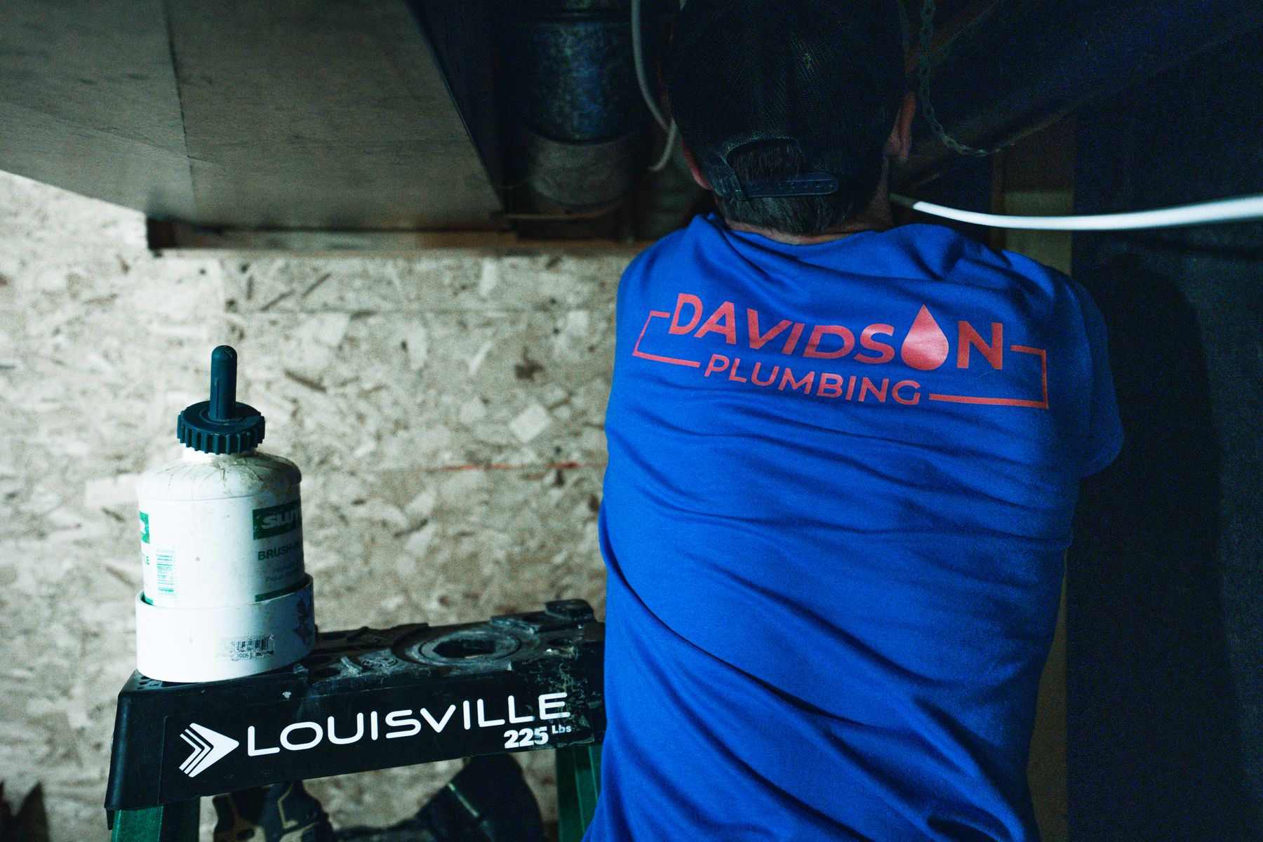 Davidson Plumbing crew on the job, photographed by Mike Mala Media